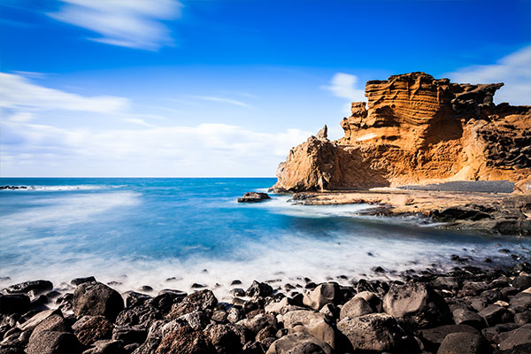 Rocky beach with rocky outcrop on Lanzarote island