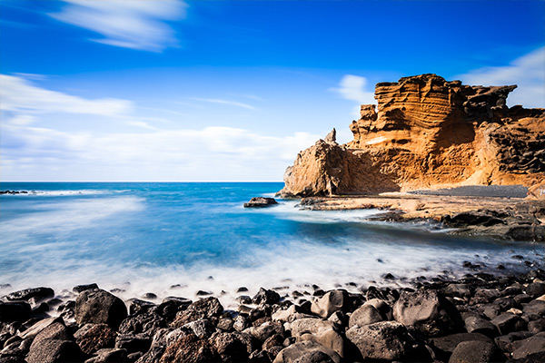 Rocky beach with cliff in Lanzarote