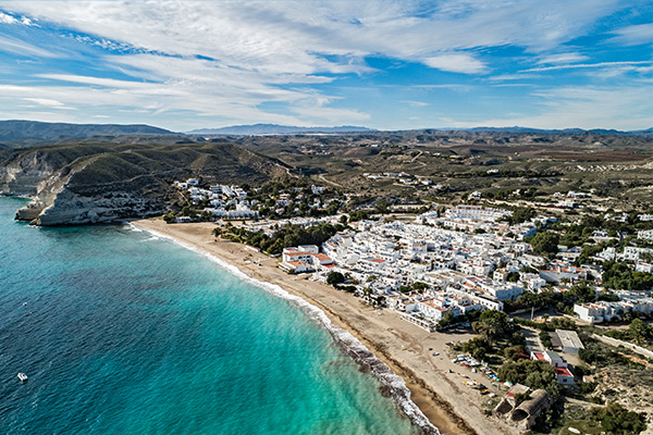Aerial shot of beach, Mediterranean Sea and white buildings in Almer&iacute;a