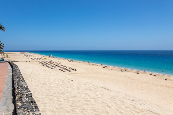 A beach with blue waters