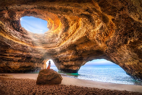 Sun shining through cave in the Algarve