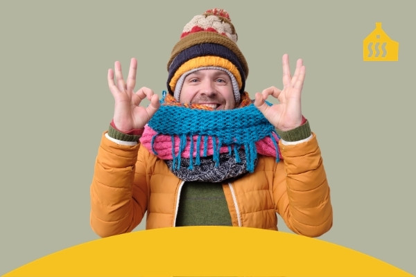 Man met winterjas en sjaals