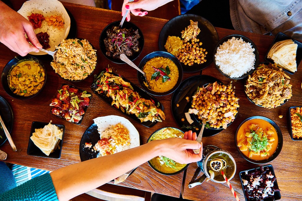 the coconut island table laid out with various dishes