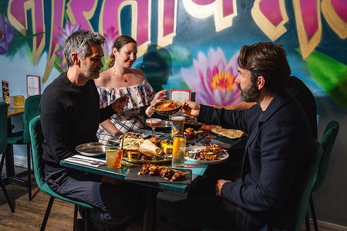 indian Summer - people eating at the table