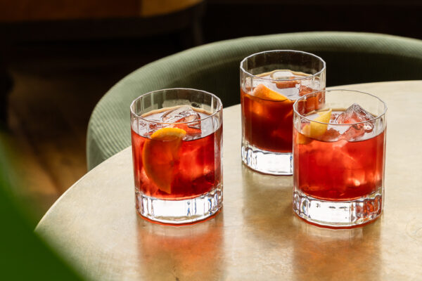Three stylish looking negronis