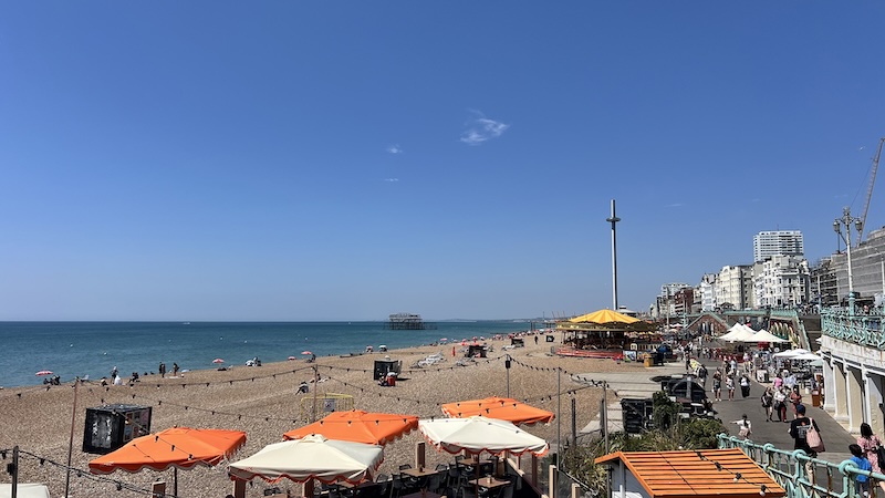 Blue sky, blue sea, pebble beach of Brighton seafront
